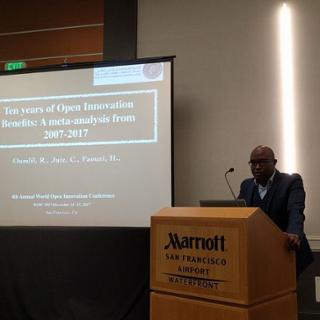 Rachid Oumlil presenting the work 'Ten years of Open Innovation Benefits' at the WOIC conference